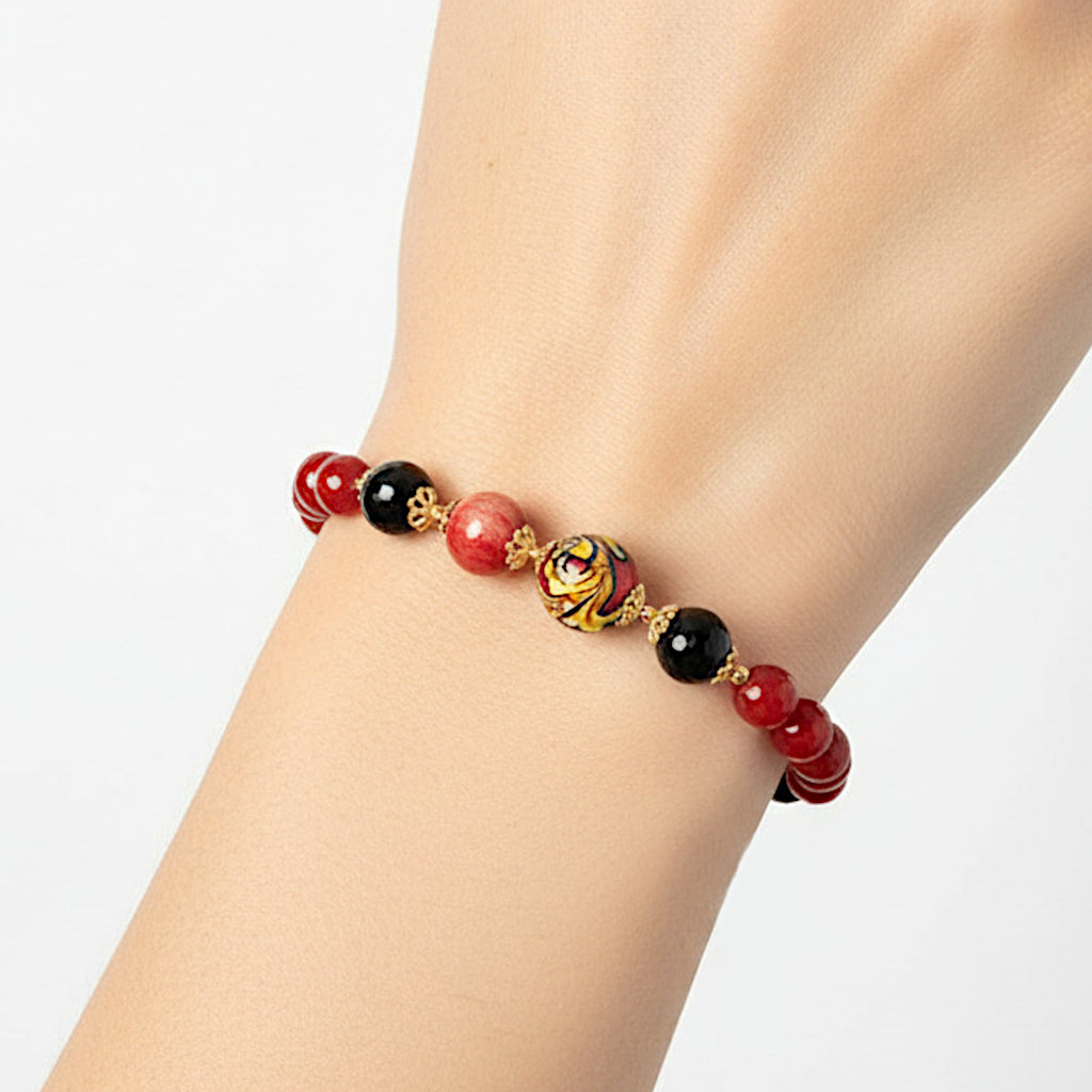 Bracciale Acicastello in agata bordeaux e perle in ceramica di Caltagirone
