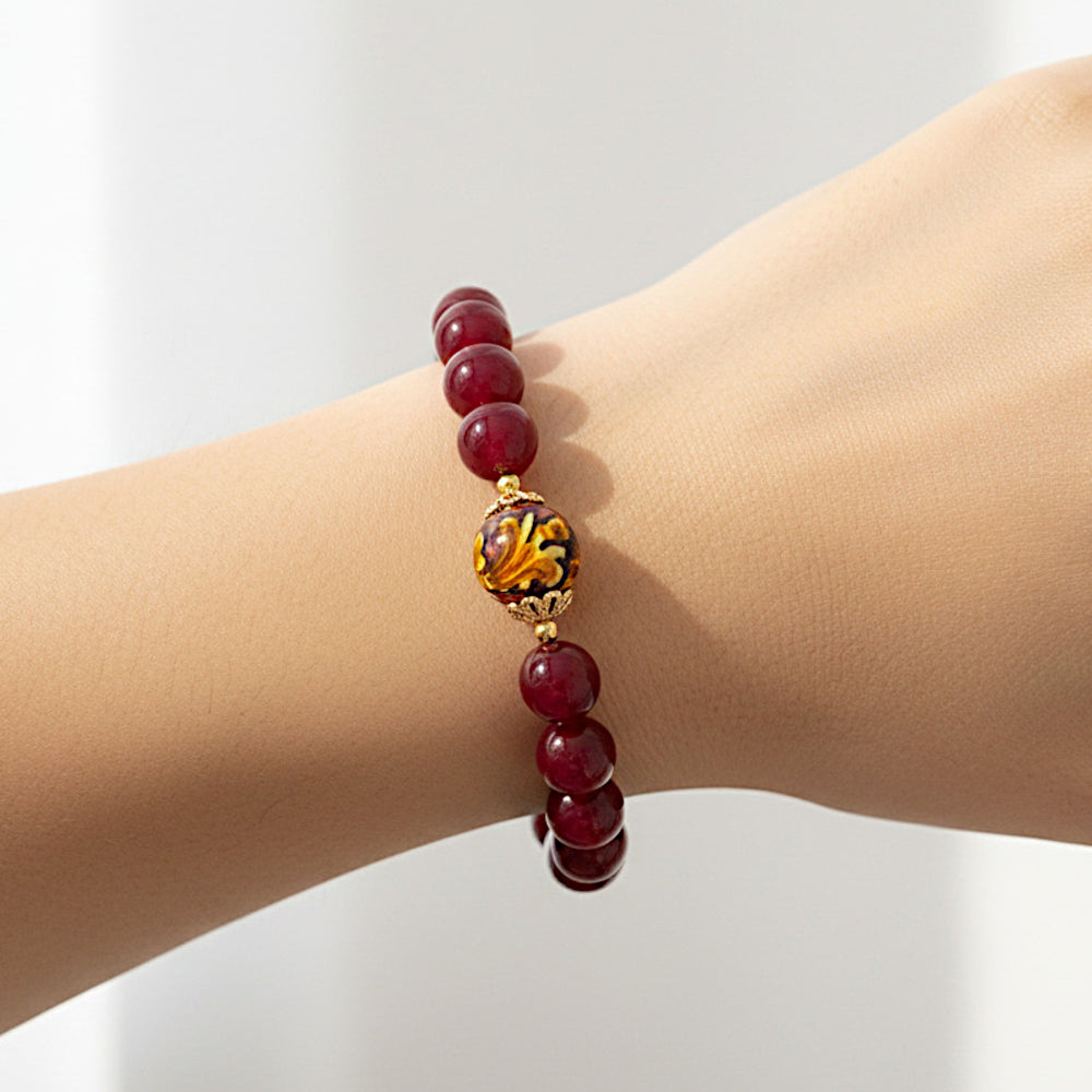 Bracciale Aura in agata bordeaux e perla in ceramica di Caltagirone