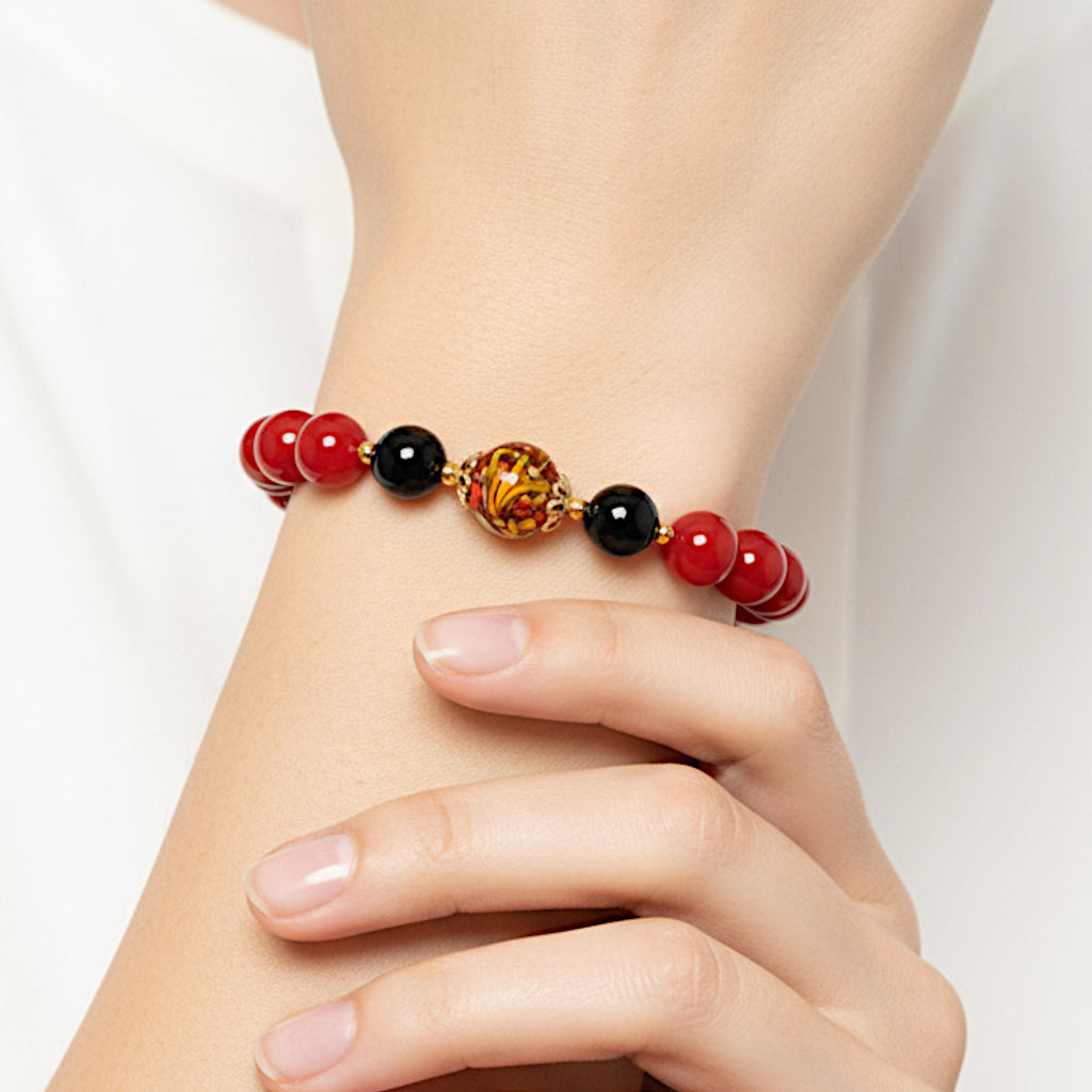 Bracciale Eos in agata bordeaux onice e perla in ceramica di Caltagirone