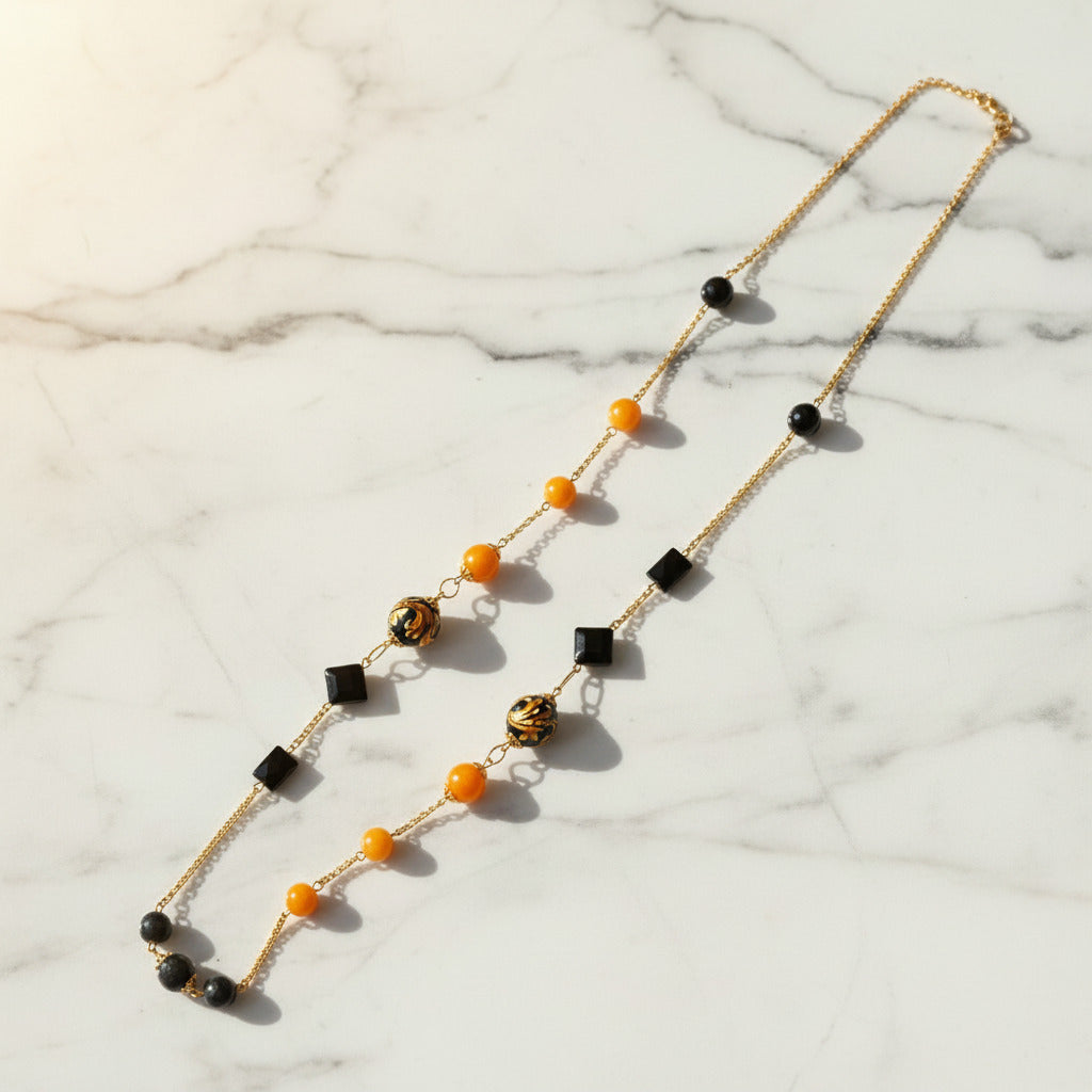 Collana Chanel 22 in agata gialla e perle in ceramica di Caltagirone